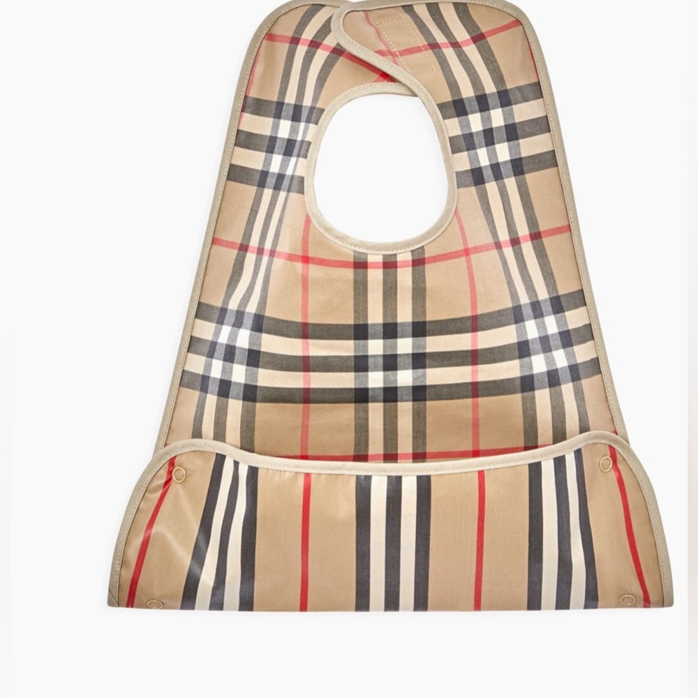Burberry bib. Bought from Saks Fifth Avenue. Very Good condition.